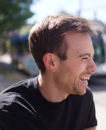Side Profile of a Man Smiling During a Sunny Day