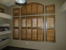 Stained horizontal louvered arch shutter