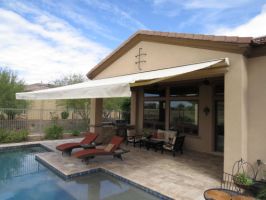 Retractable awning - Somfy powered with sun, wind, and rain sensors