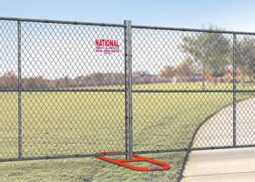 Fence panels with stands are a great alternative to post-driven temporary fencing. Ideal for outdoor events and short-term fencing projects in Phoenix, the above-ground chain link fence is portable and equipped with stands for stability. Set up is easy and customizable, so no matter the occasion, choose National for reliable perimeter security.