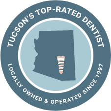 Badge saying Tucson's Top Rated Dentist Locally Owned and Operated Since 1997